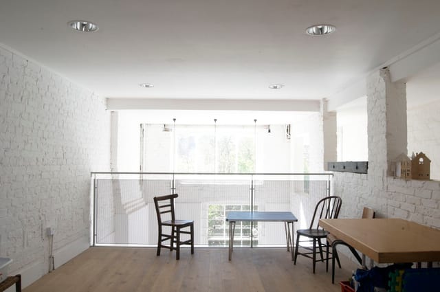 Bright minimalist meeting space in Saint Barnabas Dalston, perfect for workshops and gatherings.