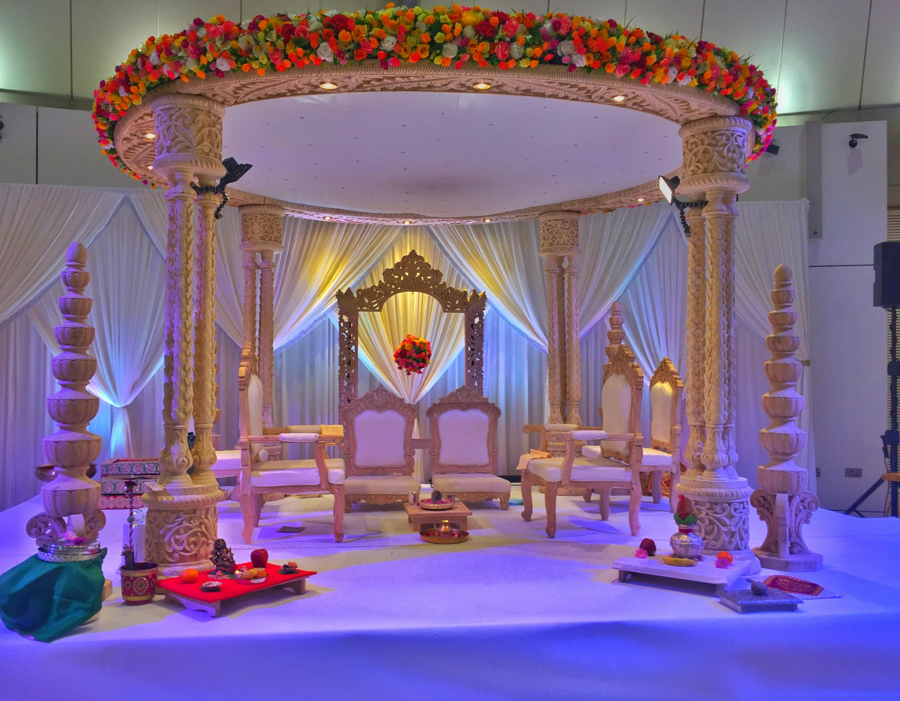 Grand Hall at Wembley with ornate stage, ideal for weddings and celebrations.