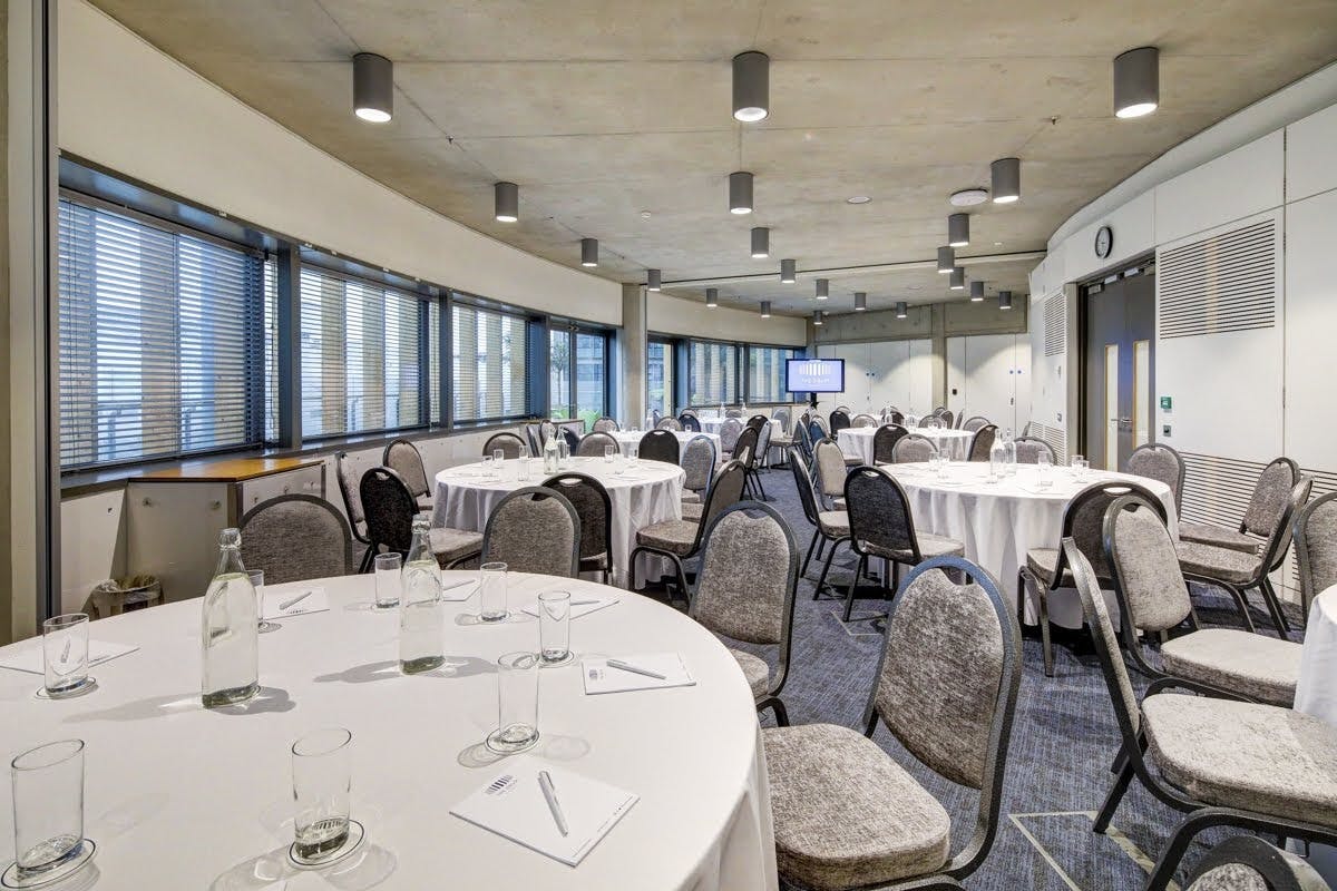 Modern boardroom at The Drum, Wembley, ideal for conferences and workshops.