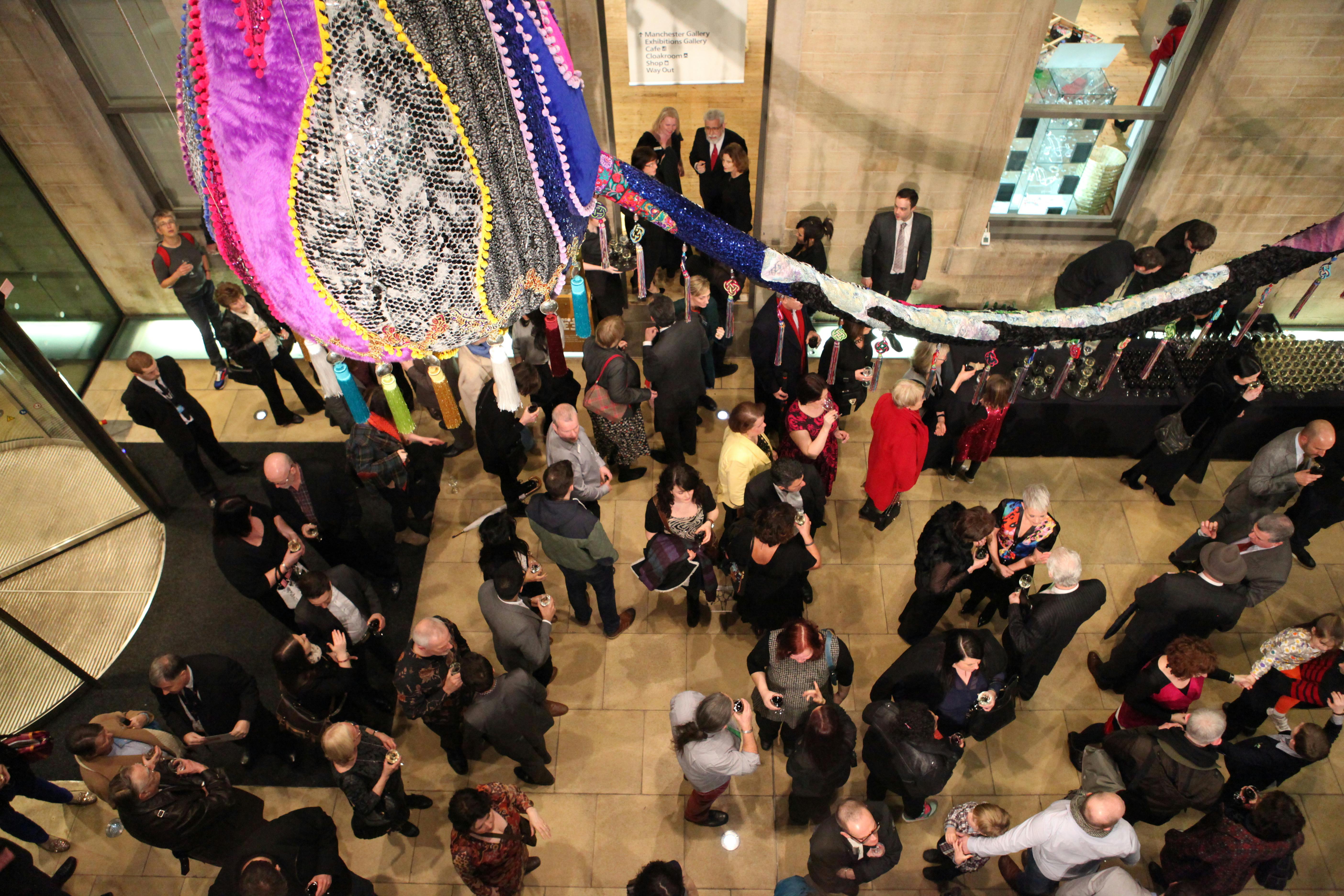 Atrium Manchester Art Gallery networking event with vibrant decor and engaging atmosphere.