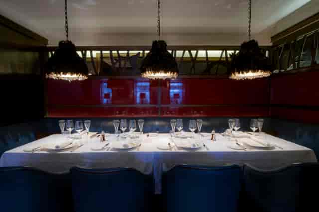 Elegant dining space at Poet’s Corner for upscale meetings and networking events.