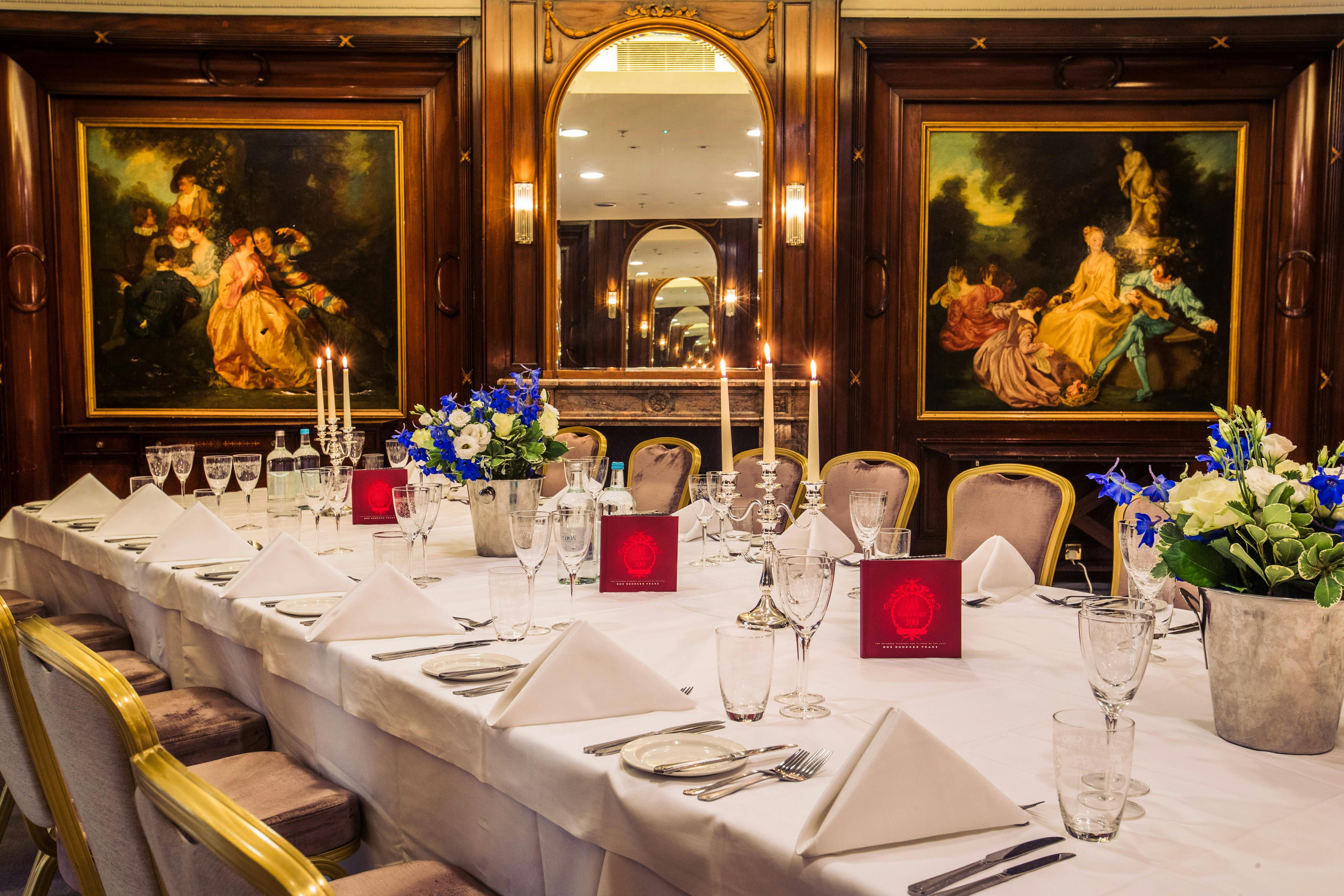 Executive Boardroom at The Waldorf Hilton, elegant dining setup for corporate events.