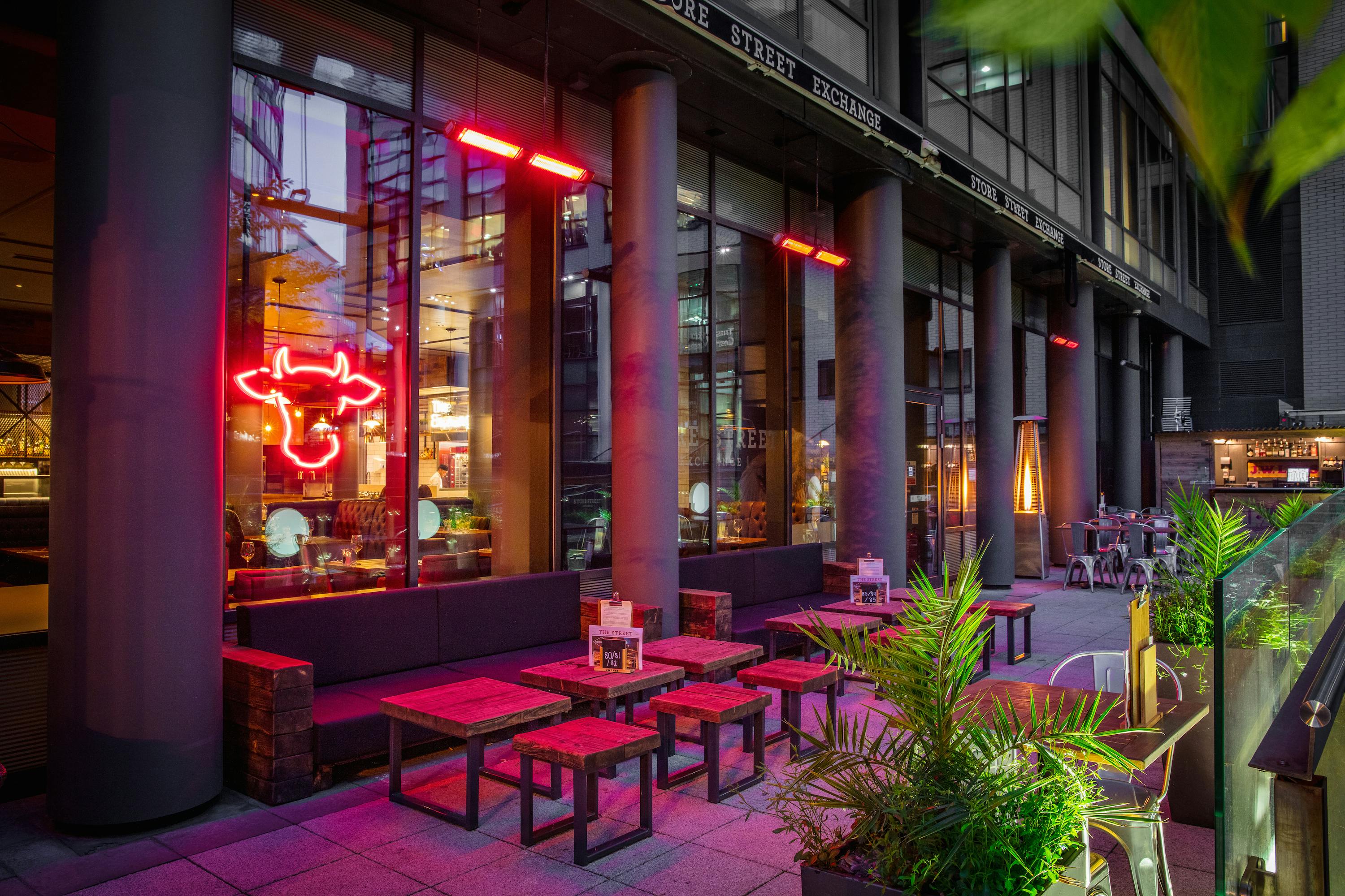 Ground Floor Terrace at DoubleTree Manchester, vibrant outdoor dining for networking events.