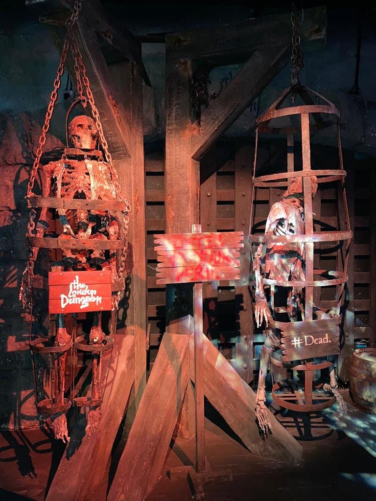 The Tavern in London Dungeon, featuring gothic architecture, perfect for spooky events.