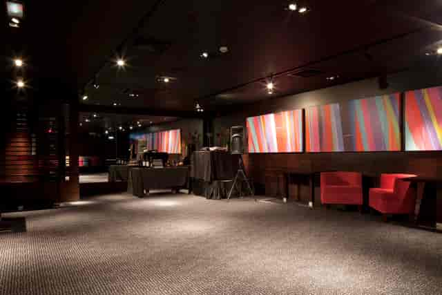 Jaipur Room at Mint Leaf: Intimate private event space with abstract art for corporate functions.