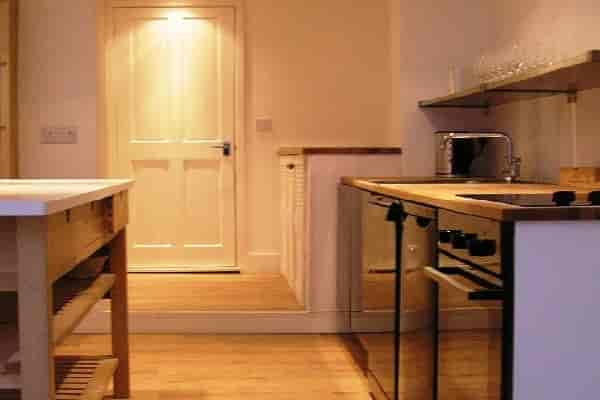 Modern kitchen in White Hart Wine Room, ideal for catering events and gatherings.