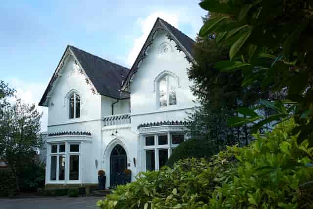 Boardroom at Didsbury House Hotel, elegant venue for corporate retreats and intimate gatherings.