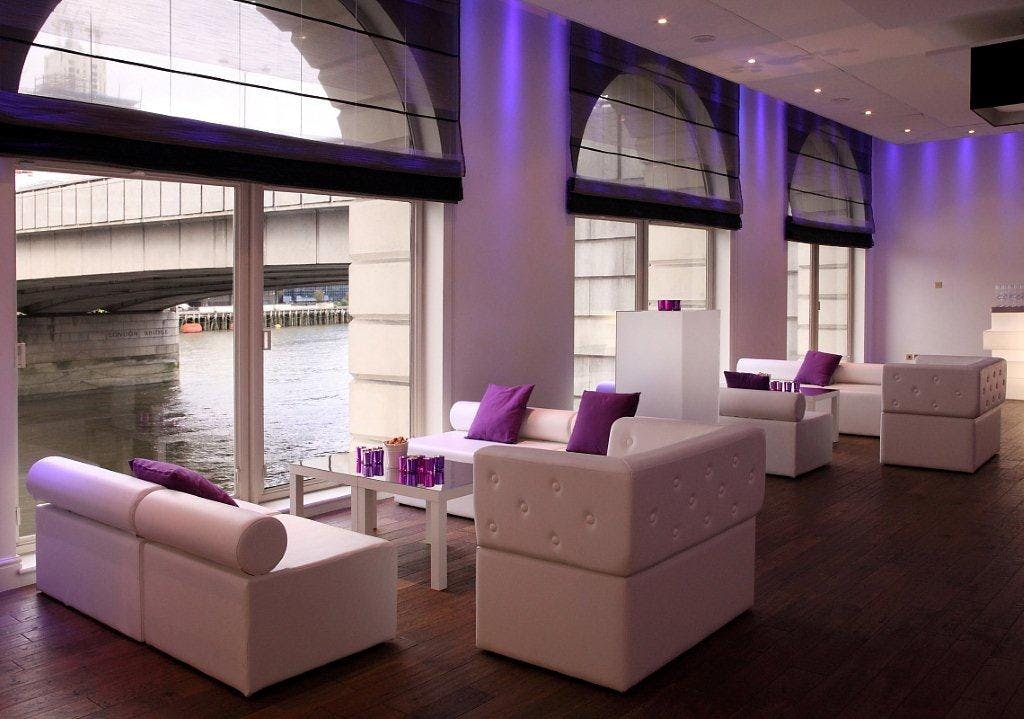 Stylish River Room at Glaziers Hall with modern furniture for networking events.