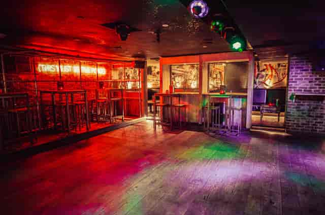 Core Bar lounge with industrial decor for evening reception and networking event.