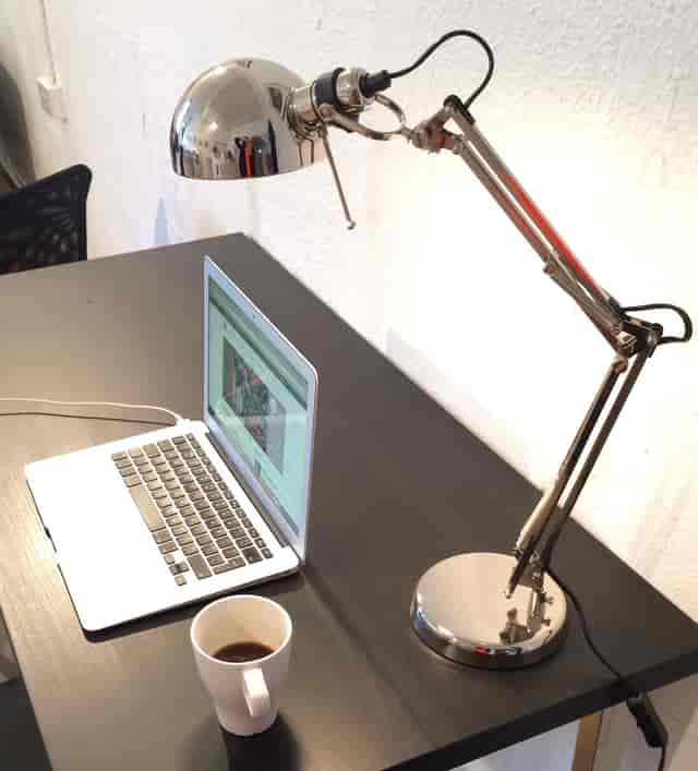 Modern workspace at BAR Gallery with sleek desk, ideal for meetings and events planning.