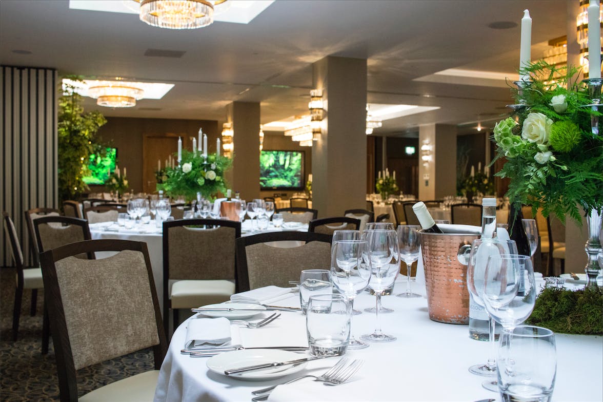 Elegant Royal London Suite set for a corporate dinner with refined decor and ambiance.