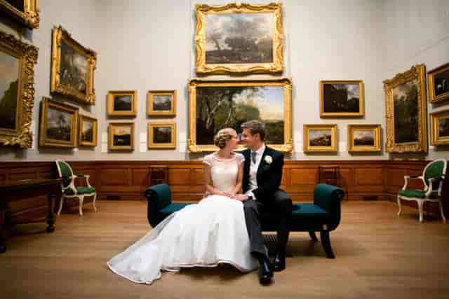 Elegant couple in The Soane Gallery, perfect for romantic weddings and intimate events.