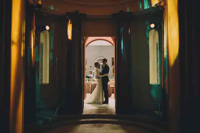 Couple in The Soane Gallery, Dulwich: elegant venue for romantic weddings and events.