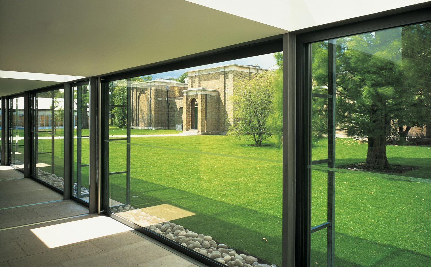 Modern meeting space with glass walls at Dulwich Picture Gallery, ideal for events. - Banner