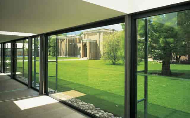 Modern meeting space with glass walls at Dulwich Picture Gallery, ideal for events.