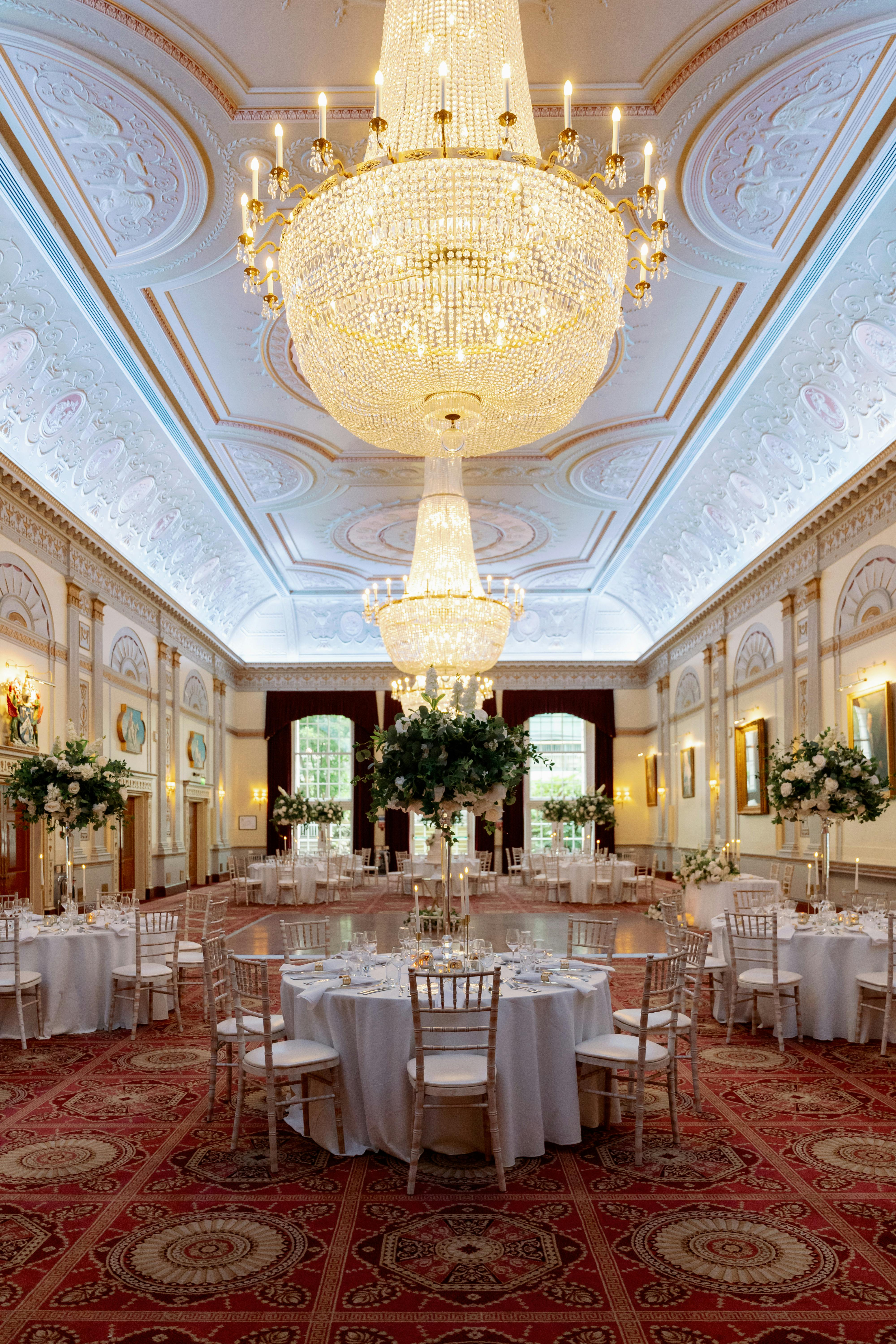 Elegant Great Hall with chandelier, ideal for weddings and corporate events.