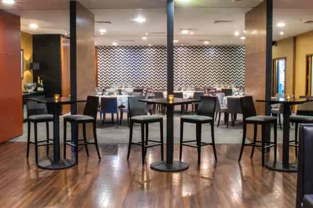 Stylish Opus Restaurant event space with modern design, ideal for networking and gatherings.