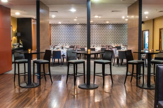 Stylish Opus Restaurant event space with modern design, ideal for networking and gatherings.