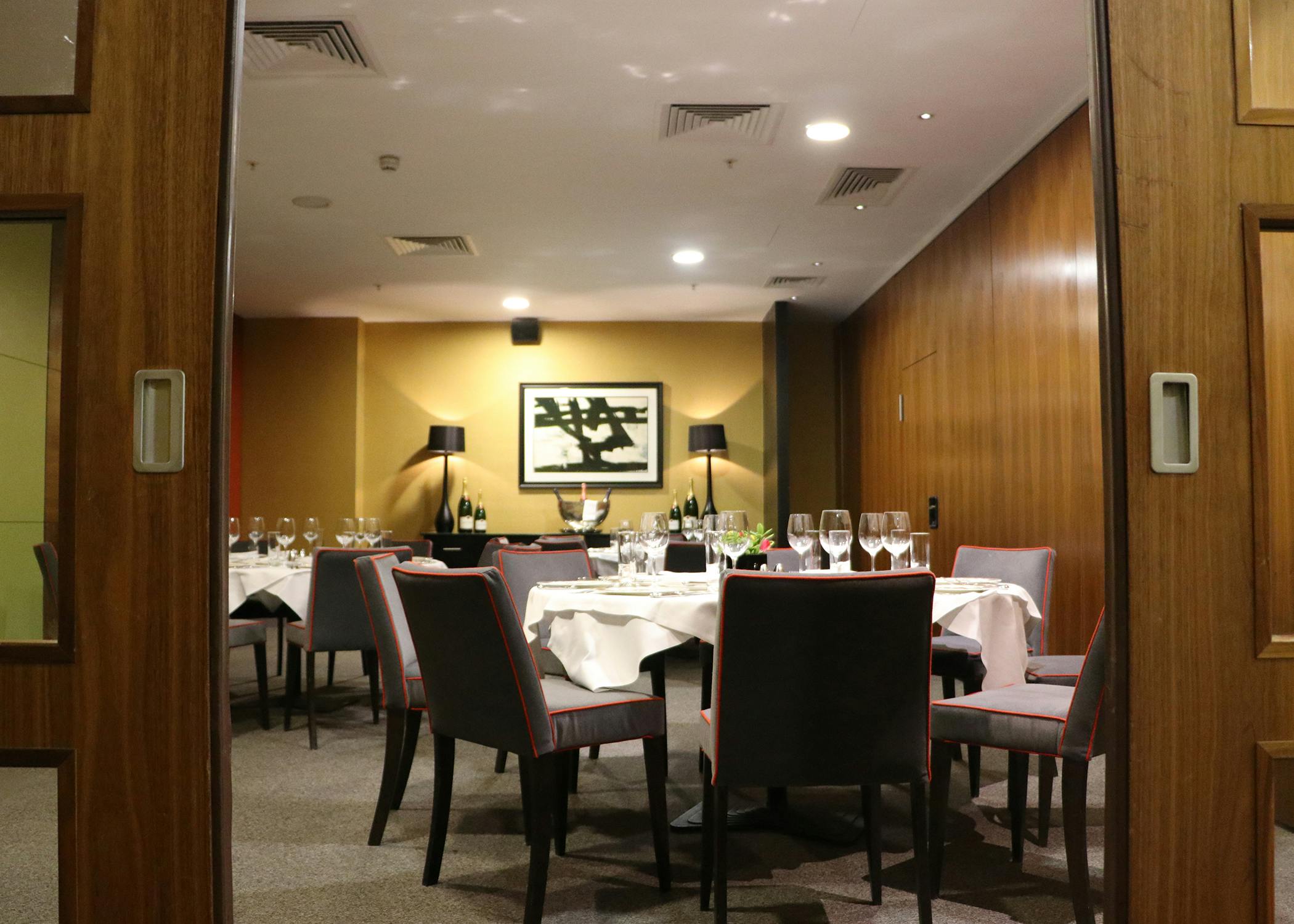 Elegant dining room at Opus Restaurant, perfect for corporate events and intimate gatherings.