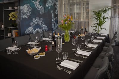 Elegant dining setup in Malmaison London for corporate meetings and events.