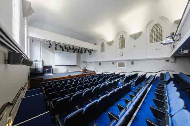 Tuke Hall auditorium with tiered seating for meetings and events in Regent's Events.
