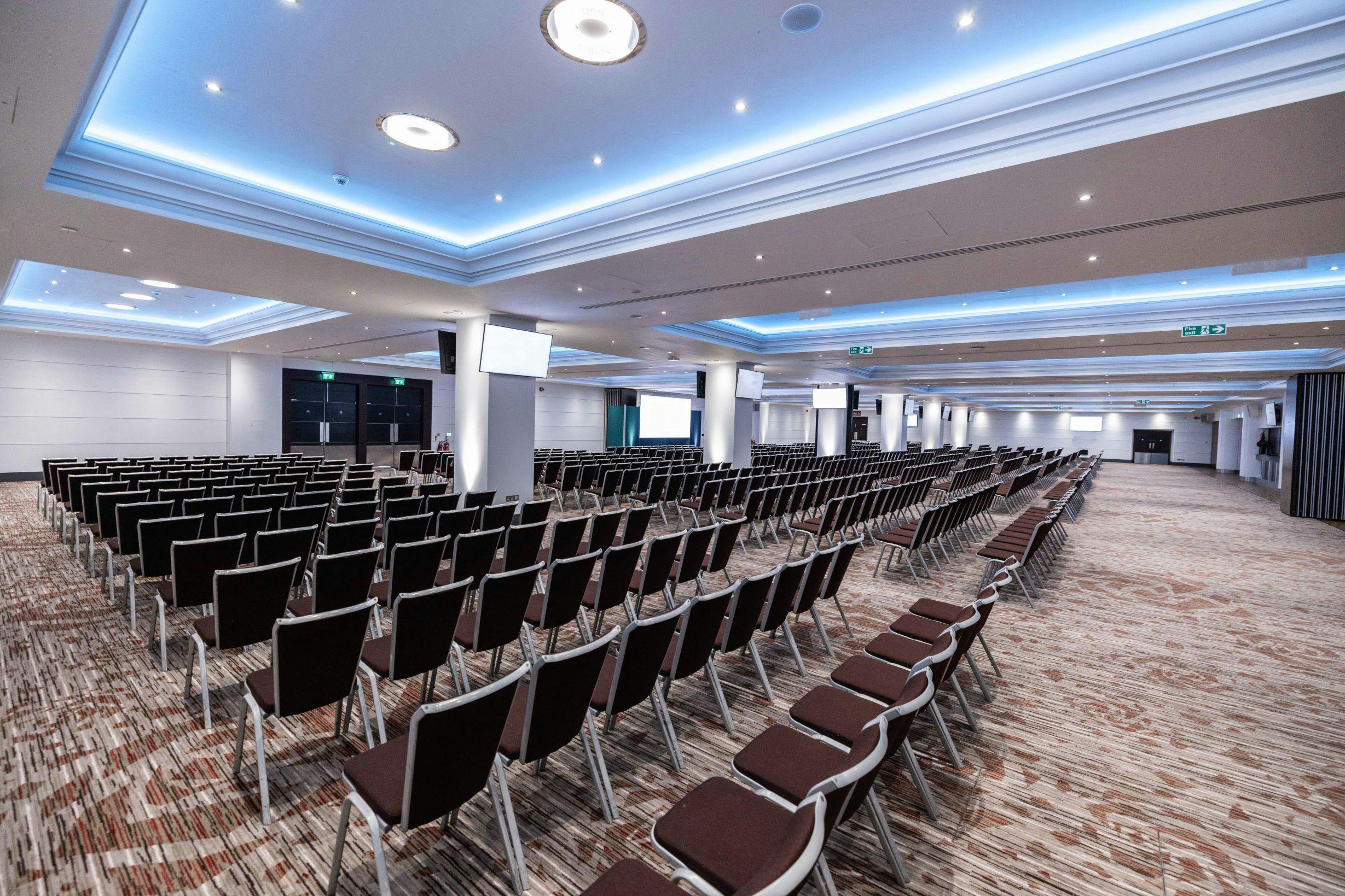 Rose Suite at Allianz Stadium: spacious conference room for events, modern design, inviting atmosphere.