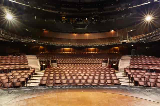 Gillian Lynne Theatre auditorium with tiered seating for conferences and performances.