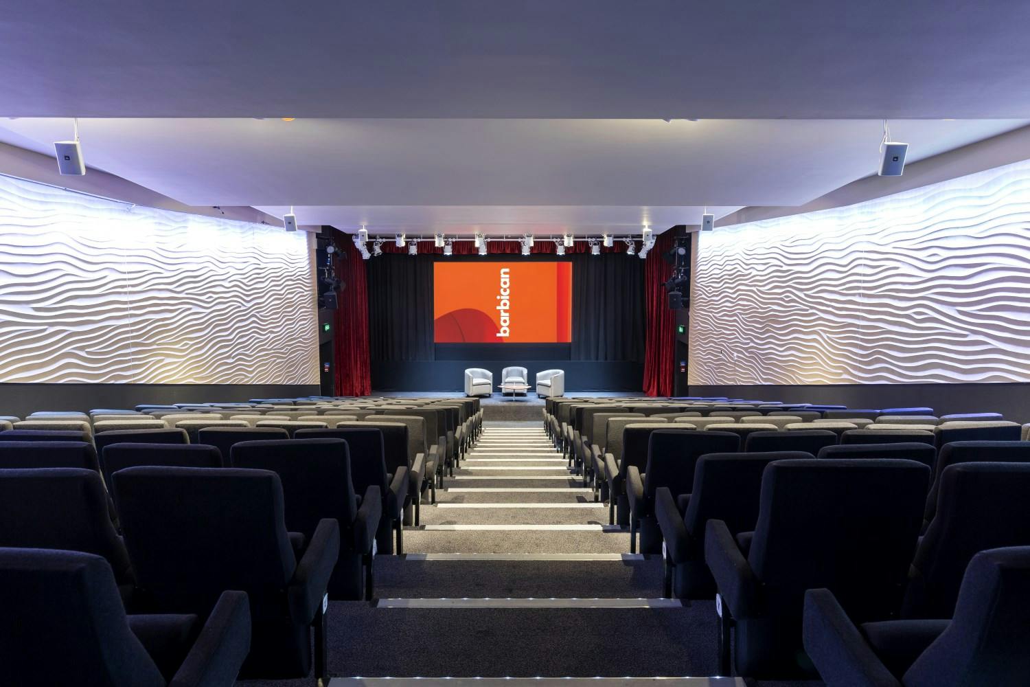 Frobisher Auditorium 2: modern event space with tiered seating for presentations and discussions.