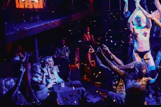 Madam Lola's Cabaret nightlife event with atmospheric lighting for immersive experiential parties.