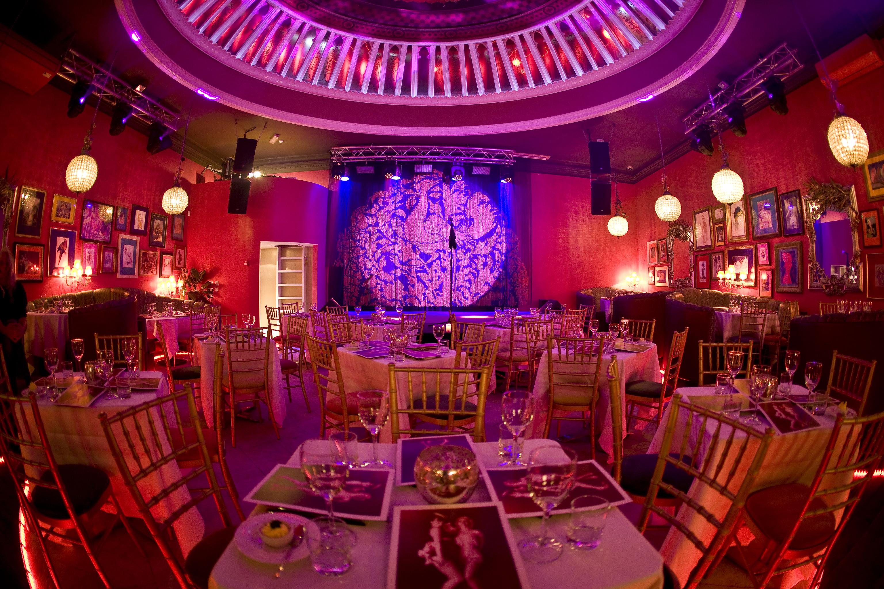 Vibrant event space at Proud Cabaret Brighton, ideal for gala dinners and corporate events. - Banner