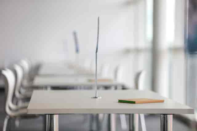 Modern meeting space in Silverstone for workshops and seminars, featuring arranged tables.