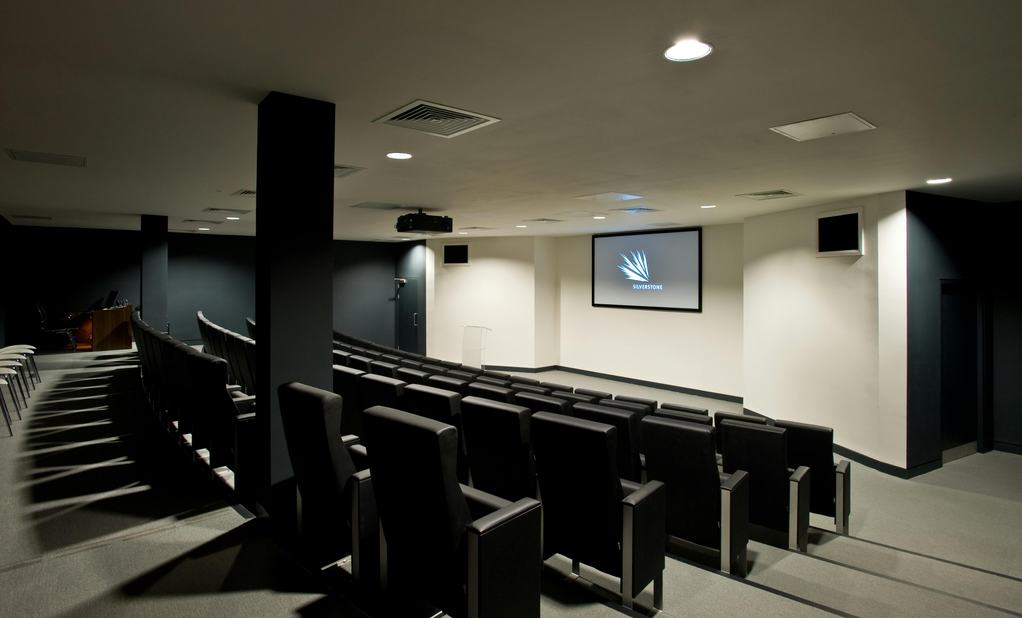 Modern auditorium with tiered seating for corporate events at Silverstone Centre.