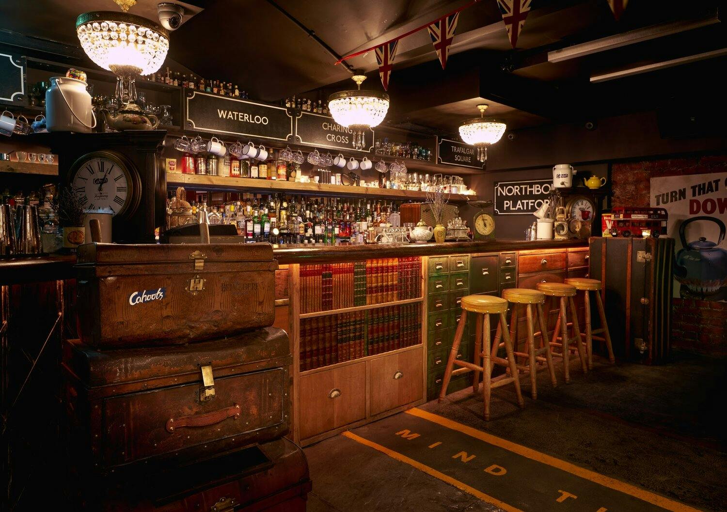 Vintage bar setting with warm lighting, ideal for networking events and gatherings.