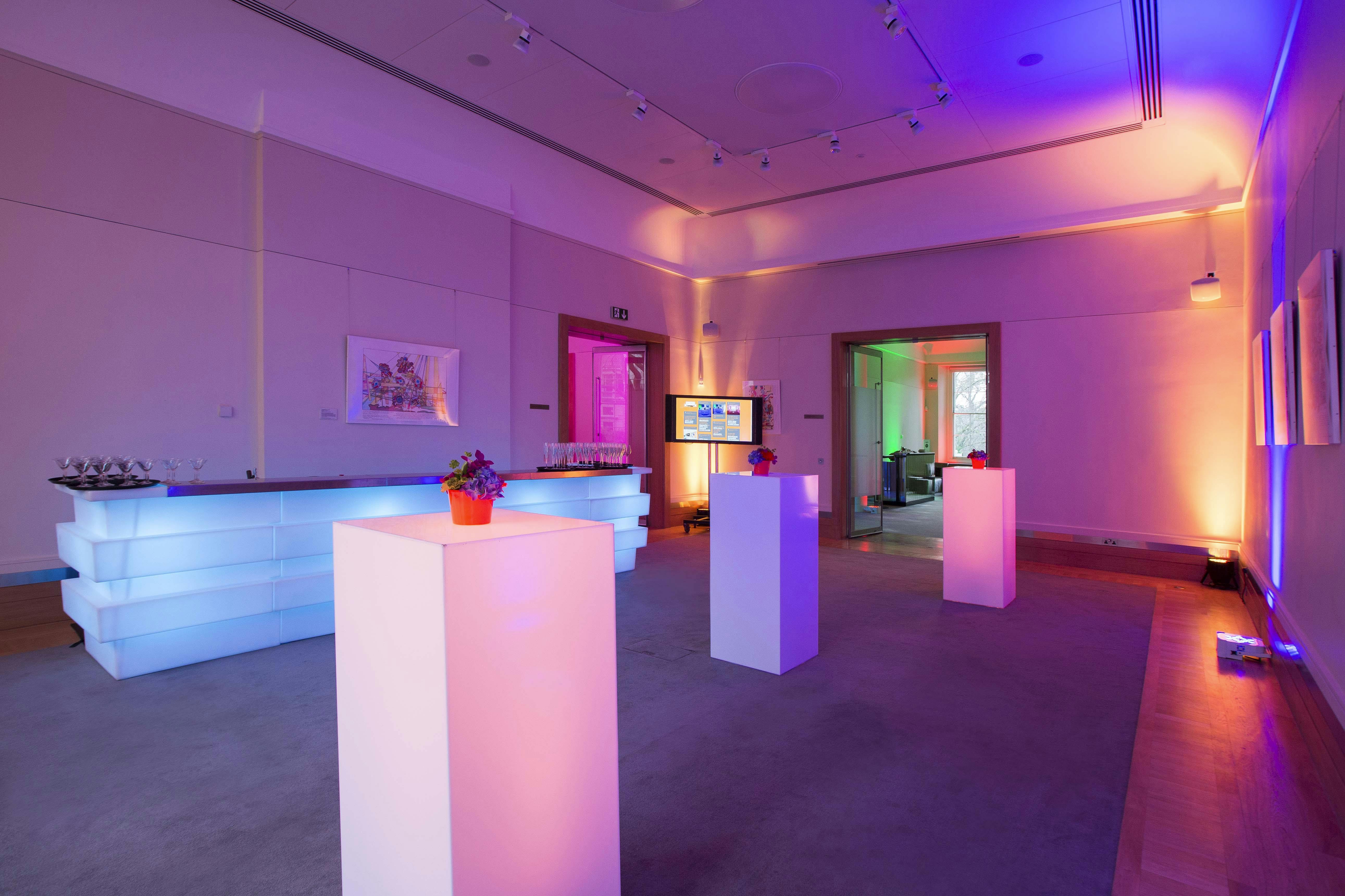 Sir Kirby Laing at Prince Philip House, modern event space with illuminated pedestals.