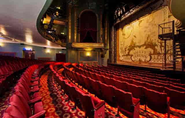 Piccadilly Theatre auditorium with proscenium stage for keynote presentations and award ceremonies.