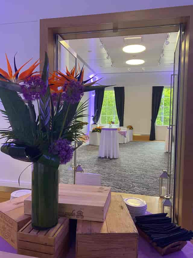 David Sainsbury at Prince Philip House, elegant event space with floral decor for receptions.