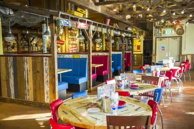 Rustic dining space at Exclusive Venue, perfect for casual gatherings and team-building events.