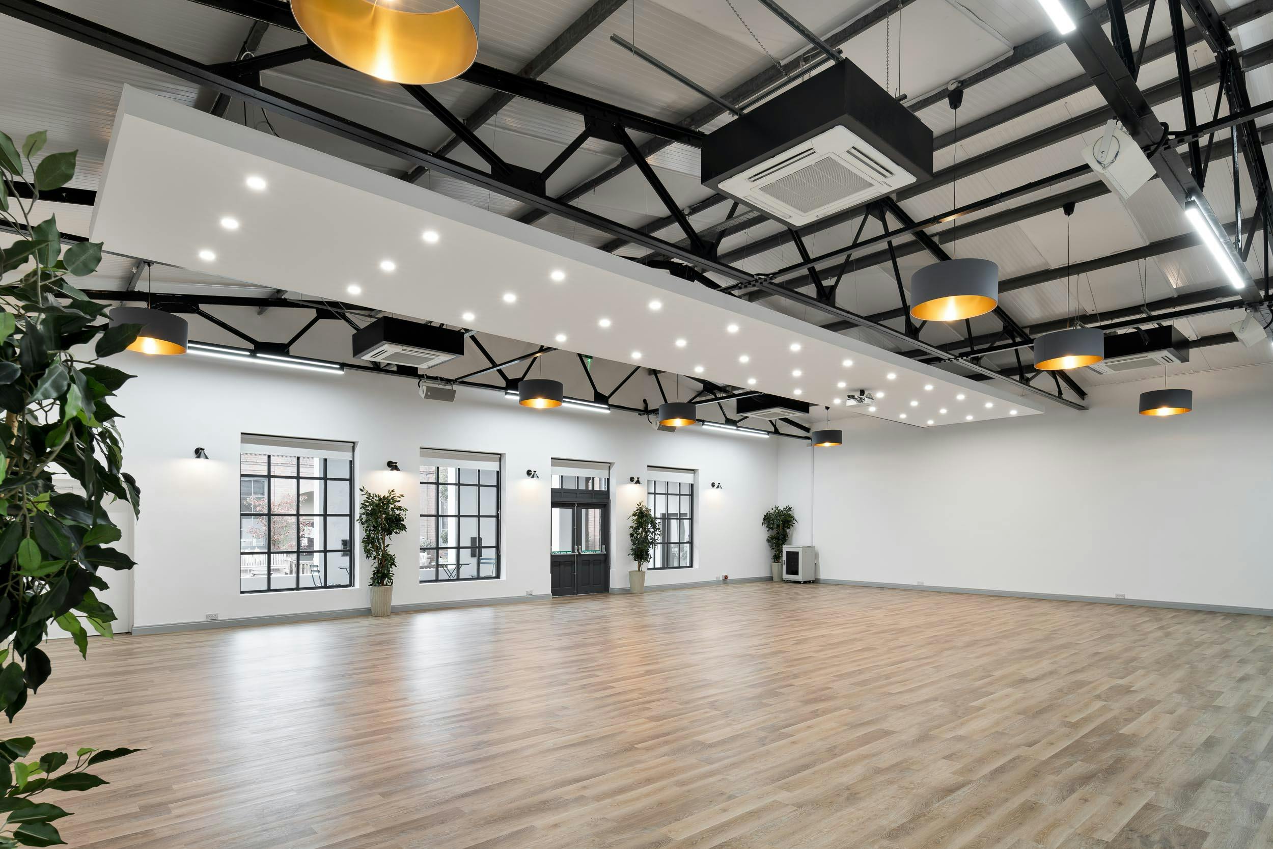 Versatile Fazeley Room with natural light, ideal for conferences and workshops.