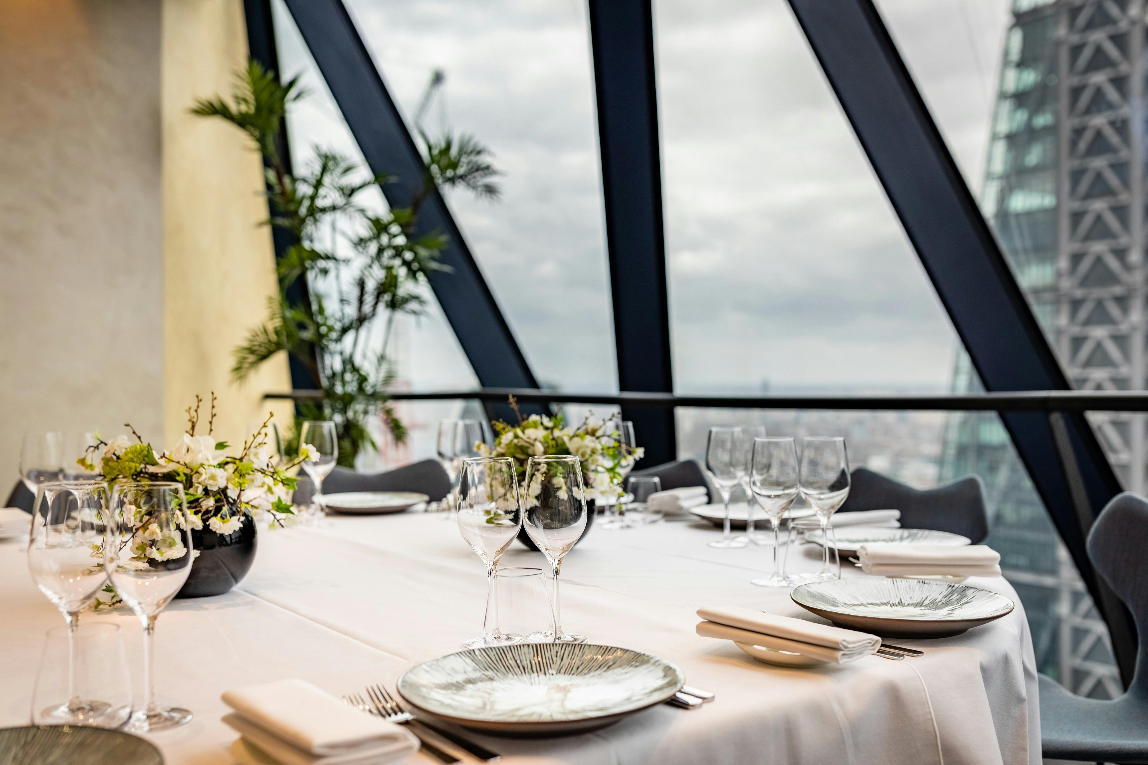 Private dining room at Searcys, Gherkin with elegant tableware for corporate events.