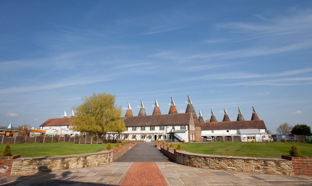 Shires venue with pointed roofs, perfect for outdoor corporate events and gatherings.