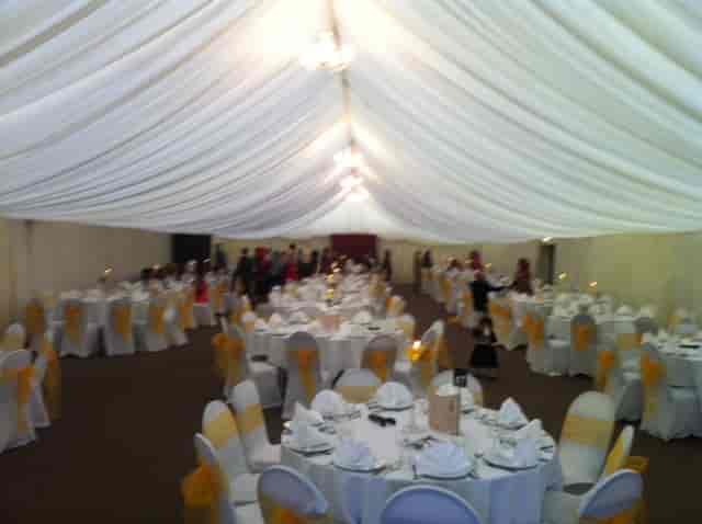 Elegant event space at The Dray, featuring draped ceilings for weddings and corporate events.