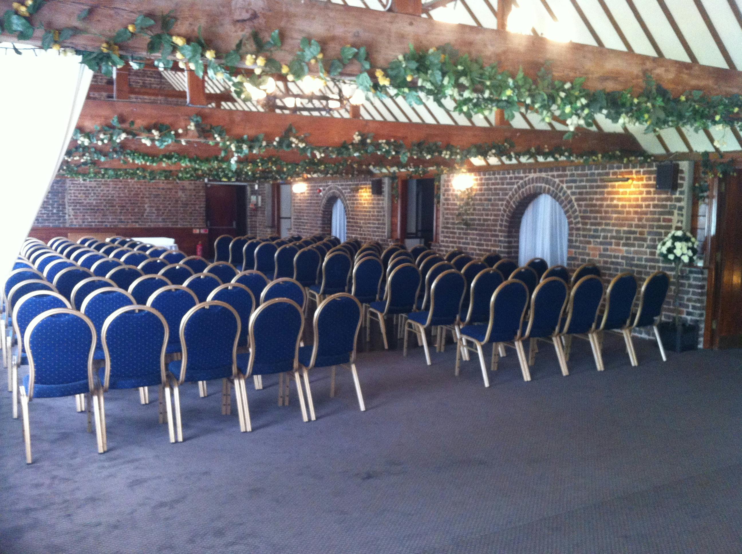 Whites Conference Suite with blue chairs, ideal for corporate events and seminars.