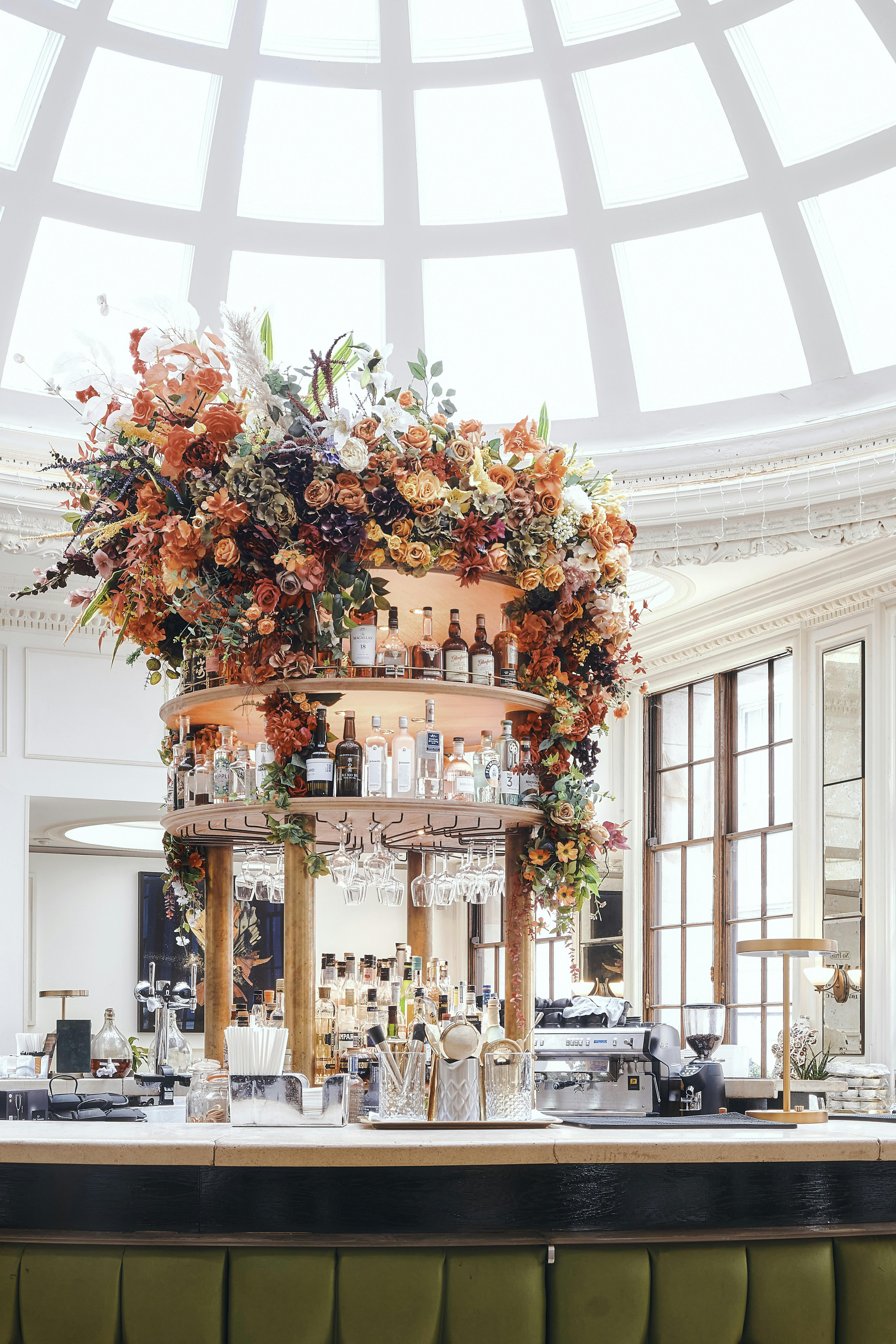 Lombard Club bar centerpiece with elegant dried flowers for upscale events.