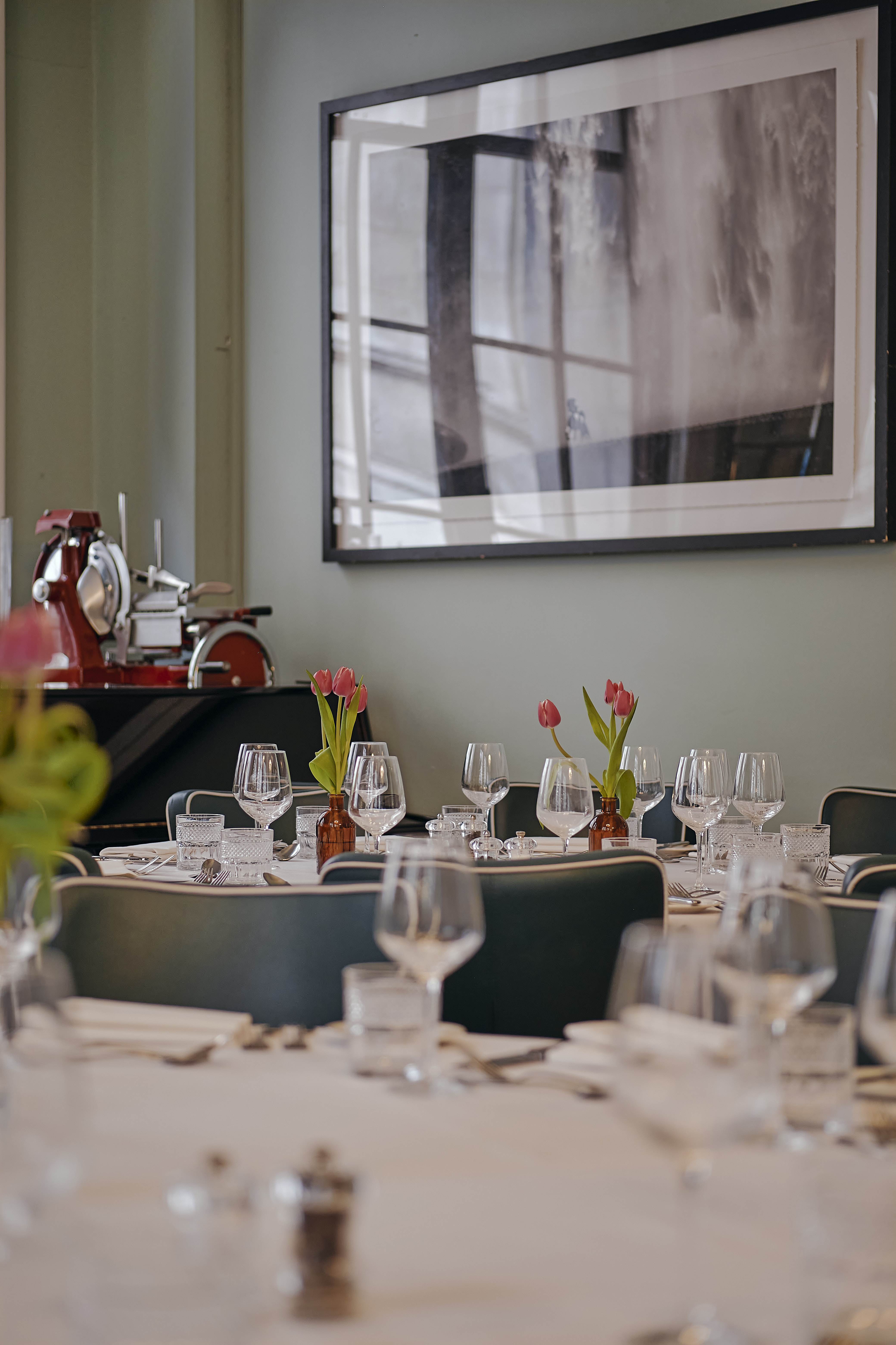 Elegant dining space with tulips at 1776 in 1 Lombard Street for corporate events. - Banner