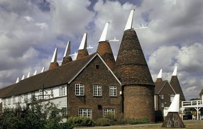 The Roundels venue with traditional oast houses, ideal for rustic weddings and corporate retreats.