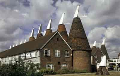 The Roundels venue with traditional oast houses, ideal for rustic weddings and corporate retreats.