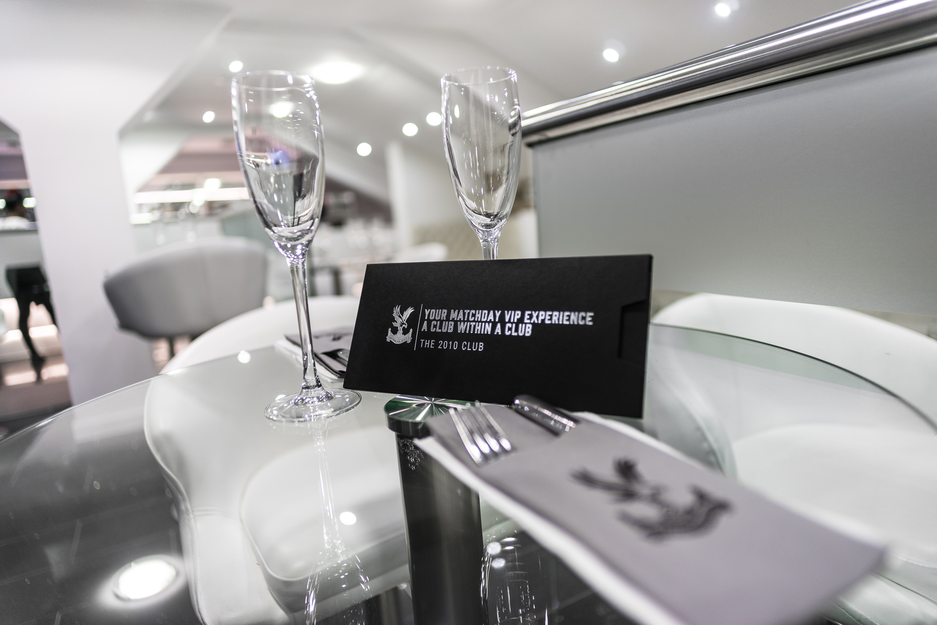 Elegant table setting with glassware at Coppell 2010, Selhurst Park for upscale events. - Banner