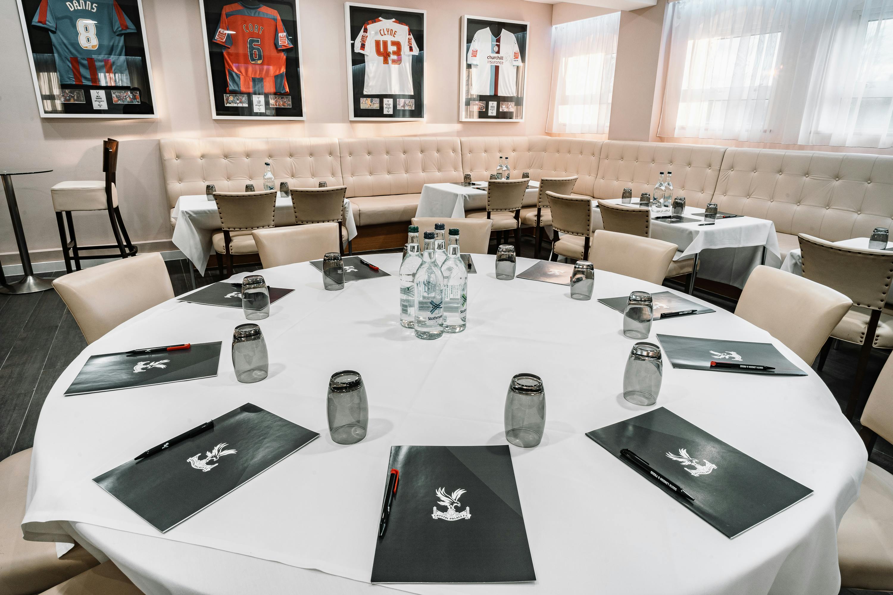 Vice President's Lounge at Selhurst Park, elegant round table for corporate meetings.