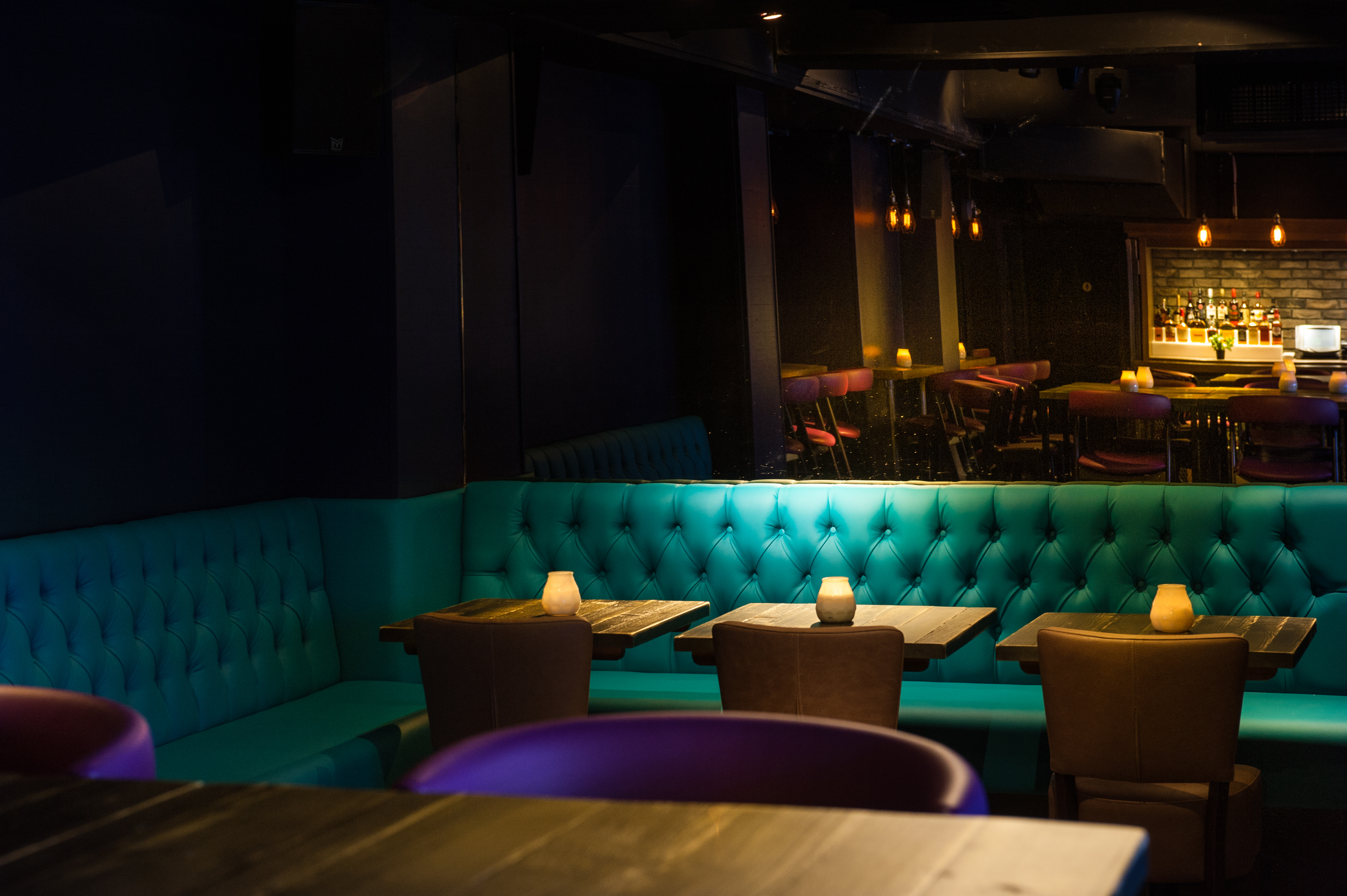Stylish Loop Bar venue with plush seating, ideal for networking events and parties. - Banner