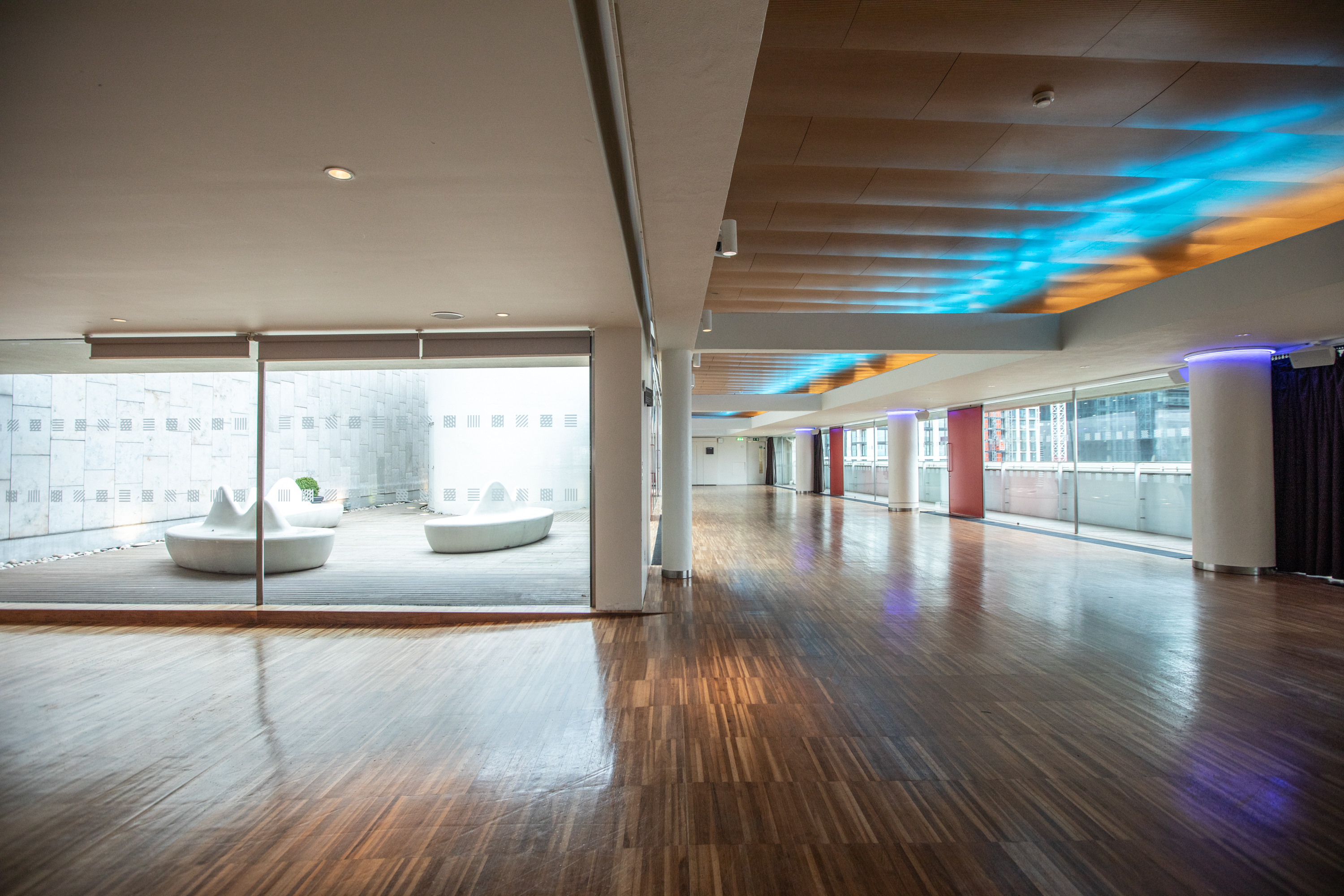 Weston Roof Pavilion: spacious event venue with large windows, ideal for corporate and social events. - Banner